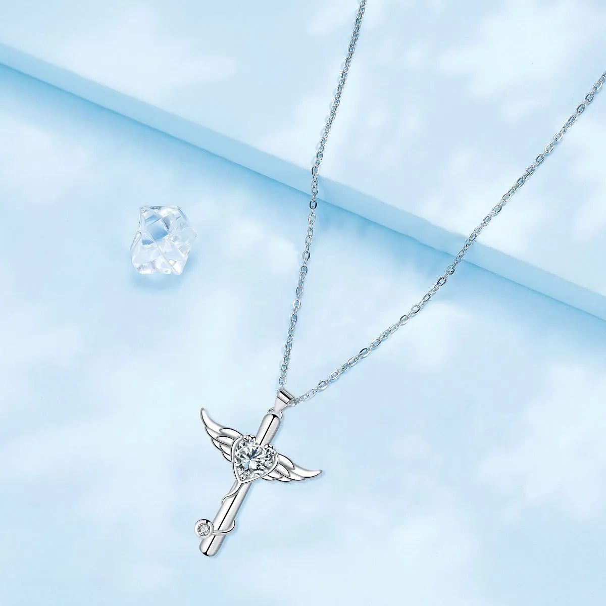 Copper electroplated necklace with a stethoscope-shaped pendant featuring a winged cross design.