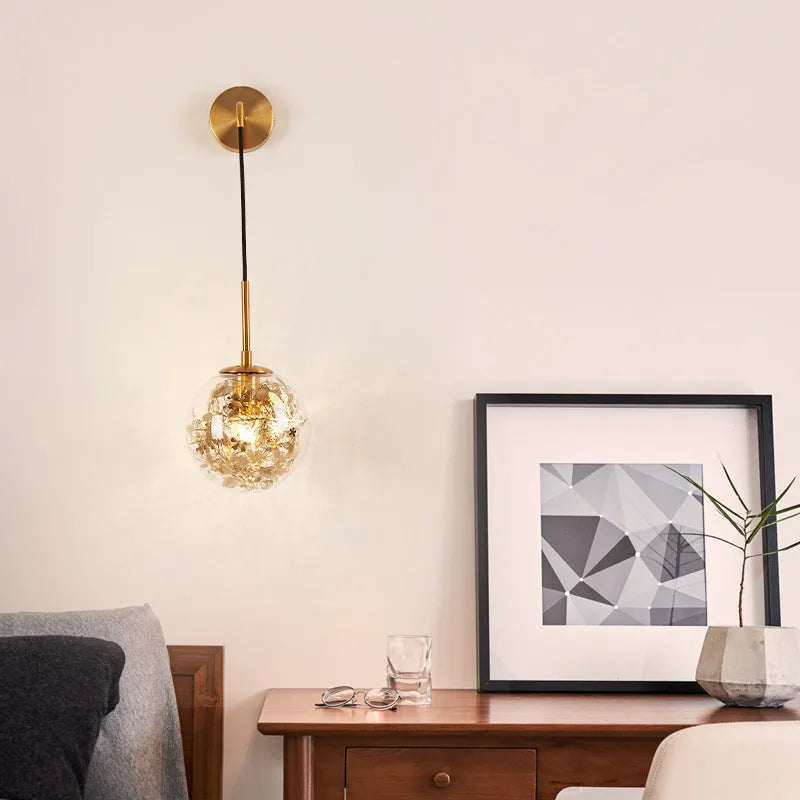 Modern glass wall lamp for bedrooms in golden flower finish with LED lighting