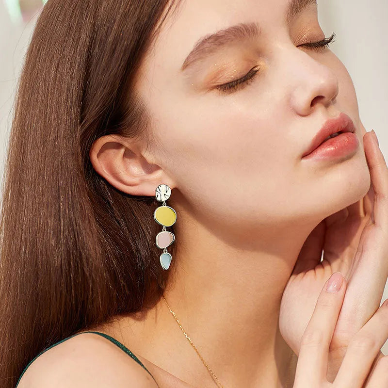 Morandi three-colour wafer disc earrings with dripping oil effect on sterling silver finish alloy.