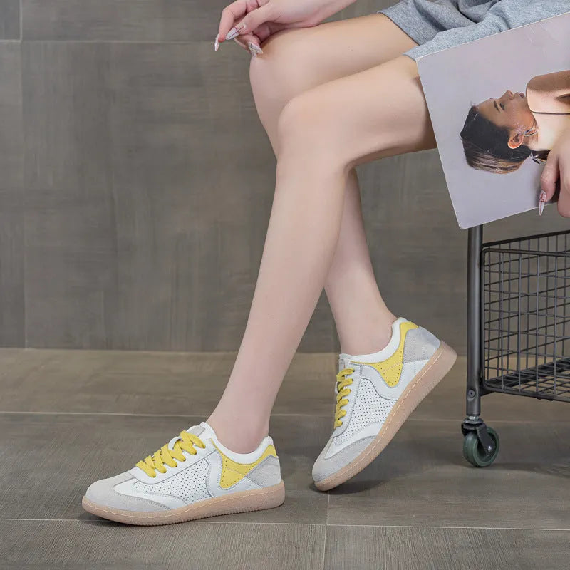 Breathable hollow casual shoes in white with cowhide upper, flat heel, and round toe
