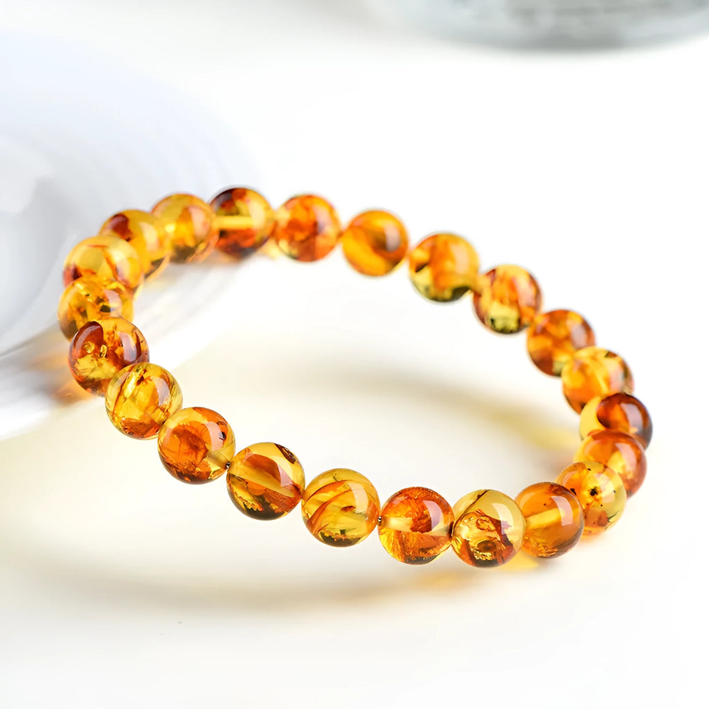 Natural yellow piebald amber bracelet with geometric polished beads for water purification