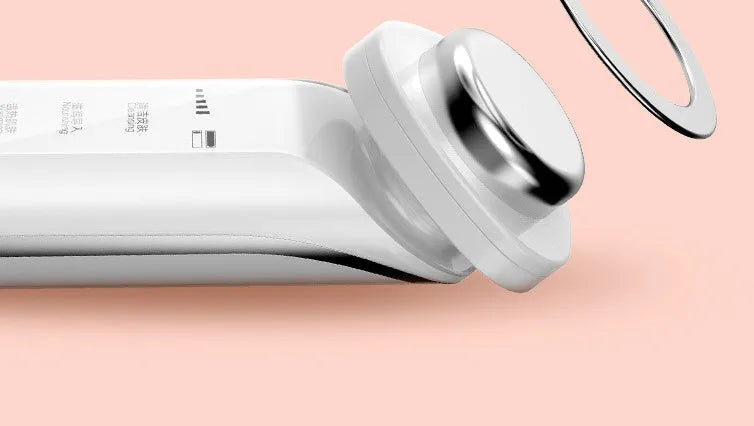 Facial cleansing instrument in pink or white, USB rechargeable, 168x46x45mm, 120g, with blackhead removal and massage functions.