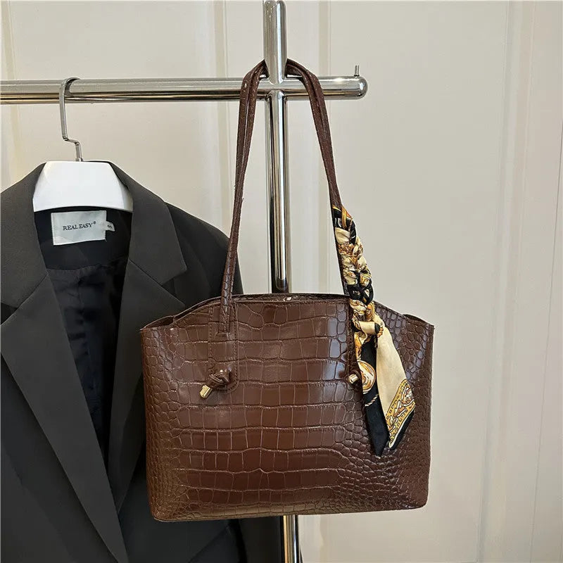Large capacity PU handbag with crocodile pattern and sewing thread detail, horizontal square shape, available in black, coffee, orange or white.