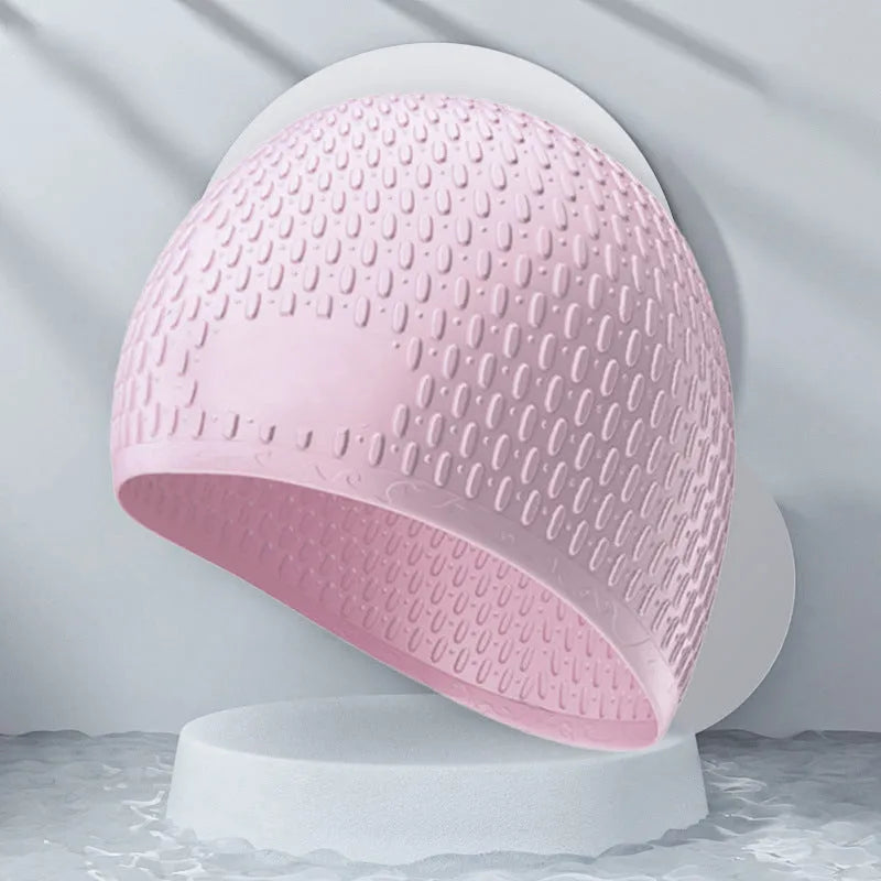 Adult solid colour silicone swimming cap with water drop design shown in multiple colour options.
