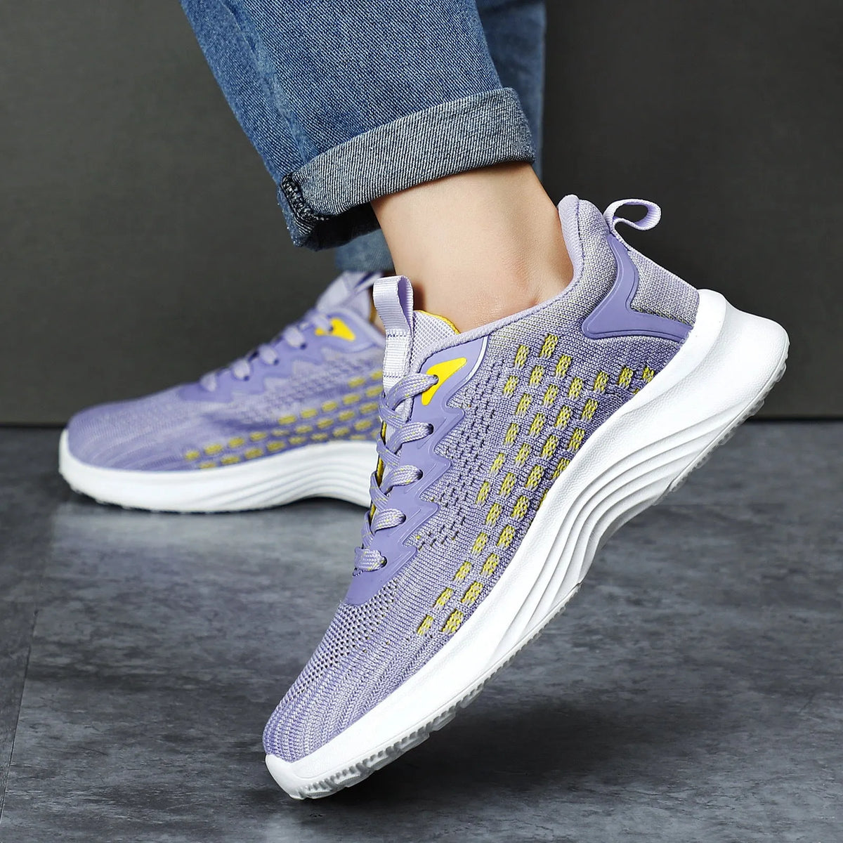 Women's Flyknit running shoes with striped pattern, mesh lining, and wedge heel in Lavender Purple or Royal Blue