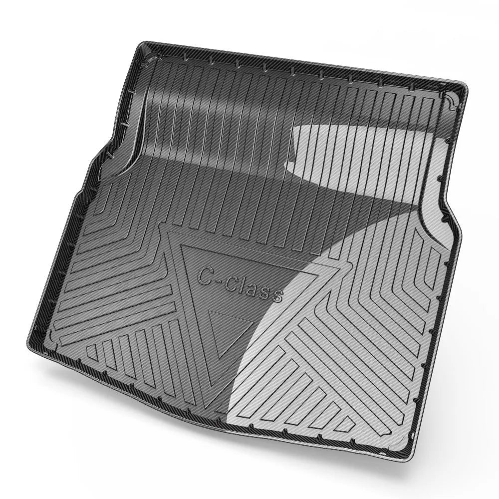 Black TPE car boot protection pad with carbon fibre pattern texture