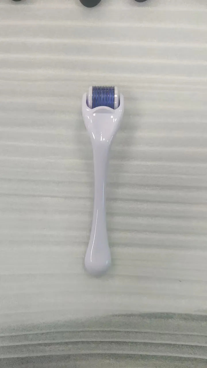 540 Micro Needle Roller device with mechanical font size display showing needle specification