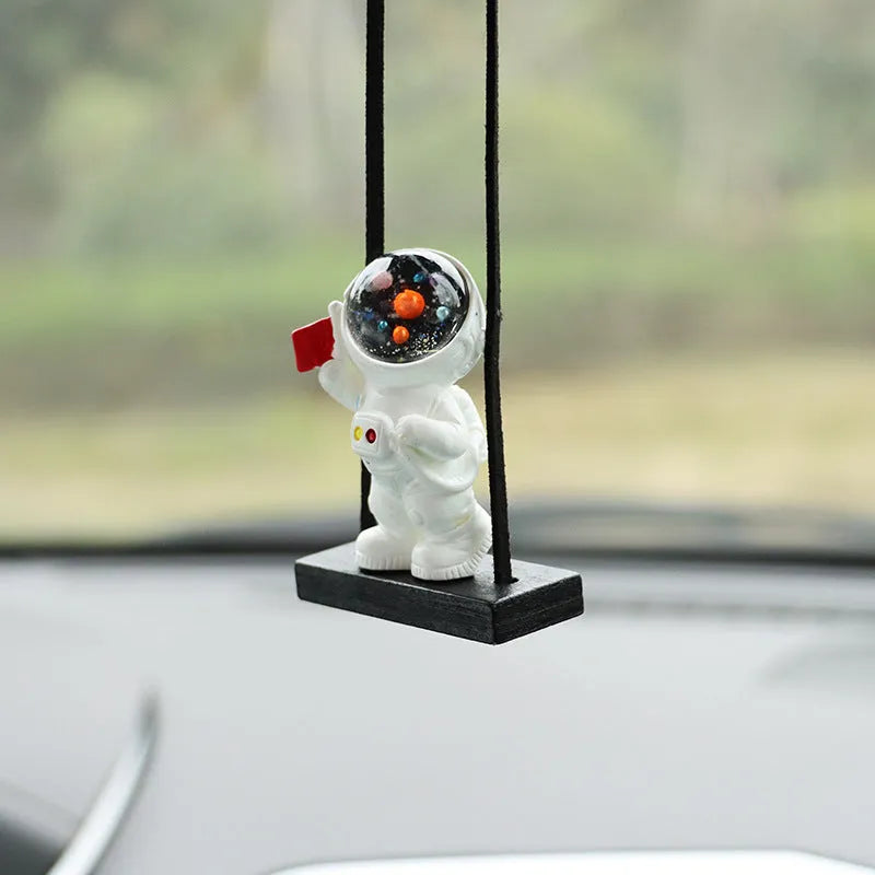 Resin cartoon astronaut car pendant decoration showing various astronaut character designs