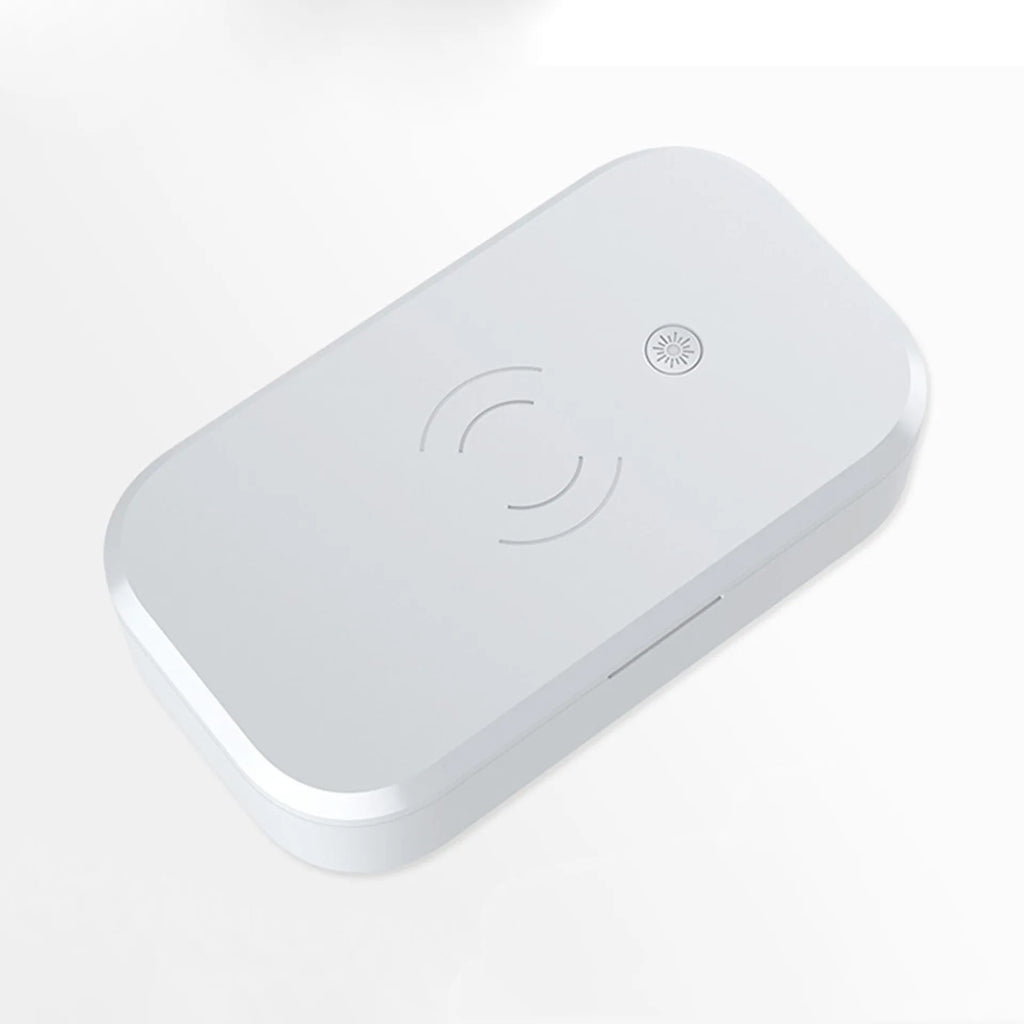 White ultraviolet disinfection box for nail tools and phones with wireless charging pad