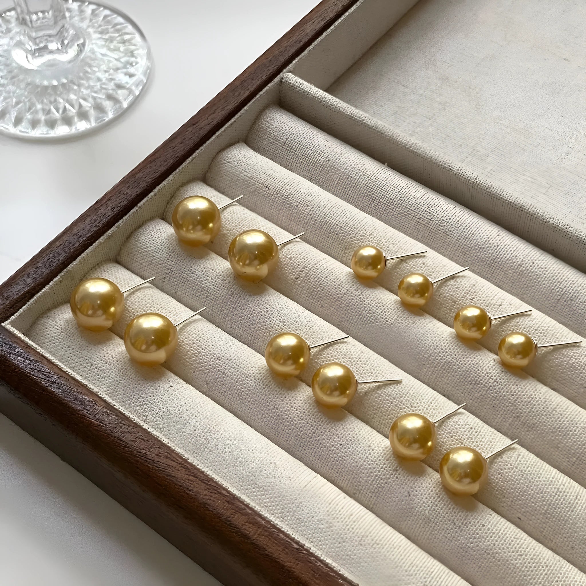 Large pearl stud earrings with eight awn star geometric design in 925 sterling silver showing 8mm to 14mm size options