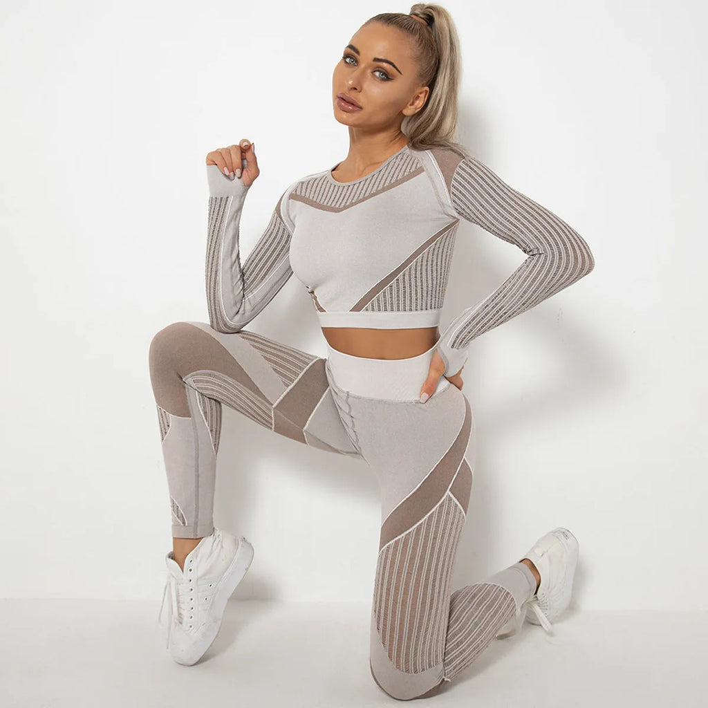 Seamless knitted long-sleeved yoga suit for women in a solid colour, showing full-length design.