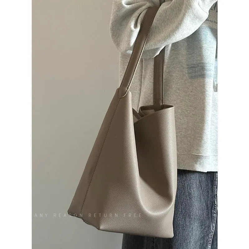 Large capacity PU bucket shoulder tote bag in grey or black, 25cm wide, 35cm high, 15cm thick, with file bag interior and sewing thread detail