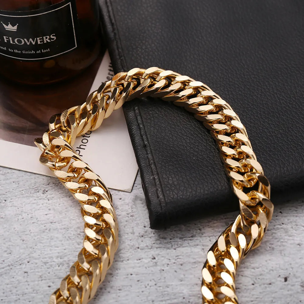 Gold coloured thick chain necklace for women, 32cm long with a 6cm pendant drop.