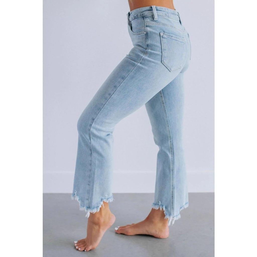 Women's solid colour denim pants with hand-worn finish in dark blue and light blue options