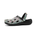 Black women's platform sandals with rhinestone decoration on EVA construction