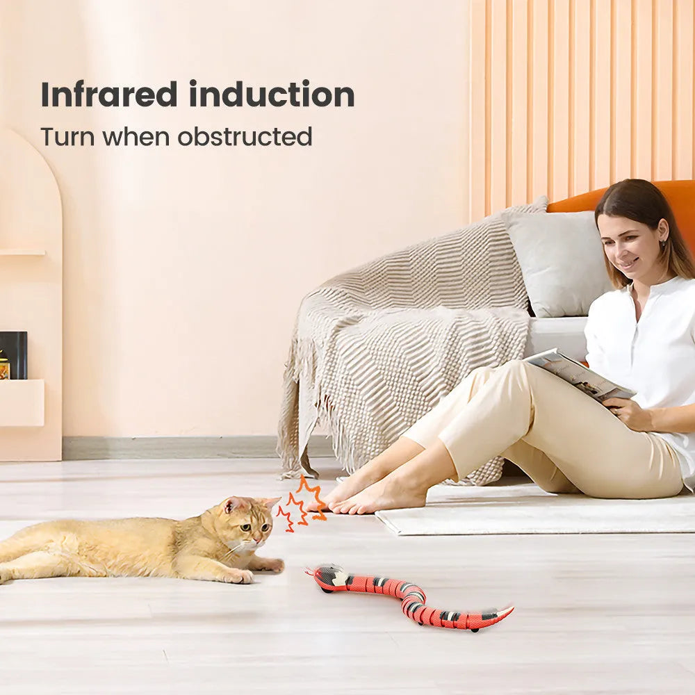 Tricky interactive sleeping electric induction snake toy in plastic, 40cm long, realistic snake prop for pranks.