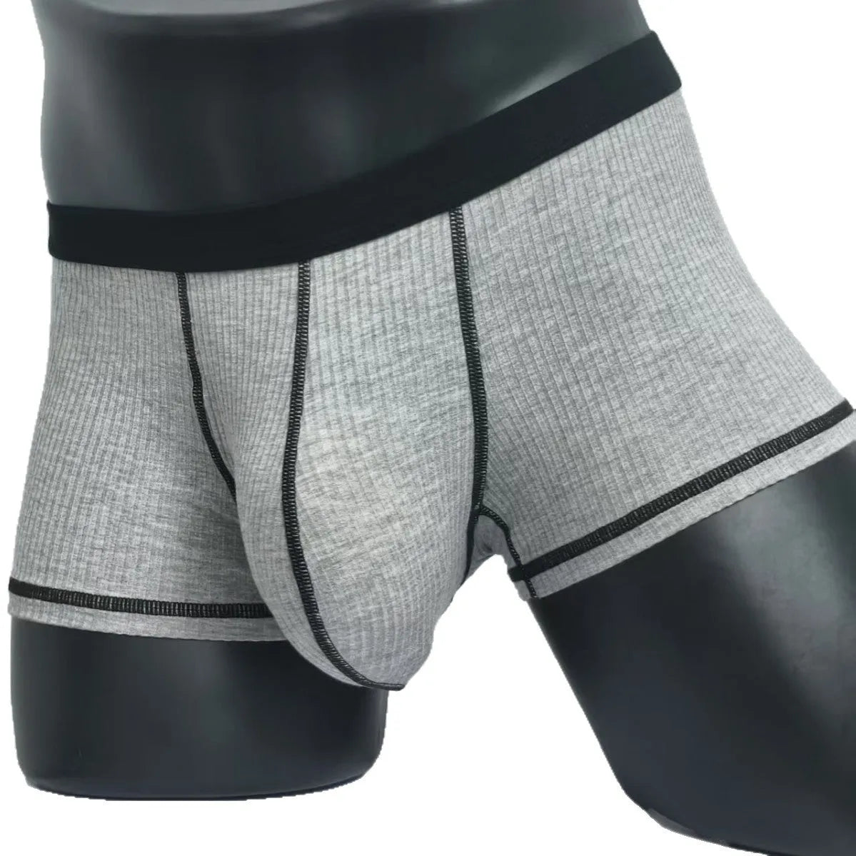 Men's solid colour boxer shorts in Army Green on a white background, showing the breathable fibre fabric.
