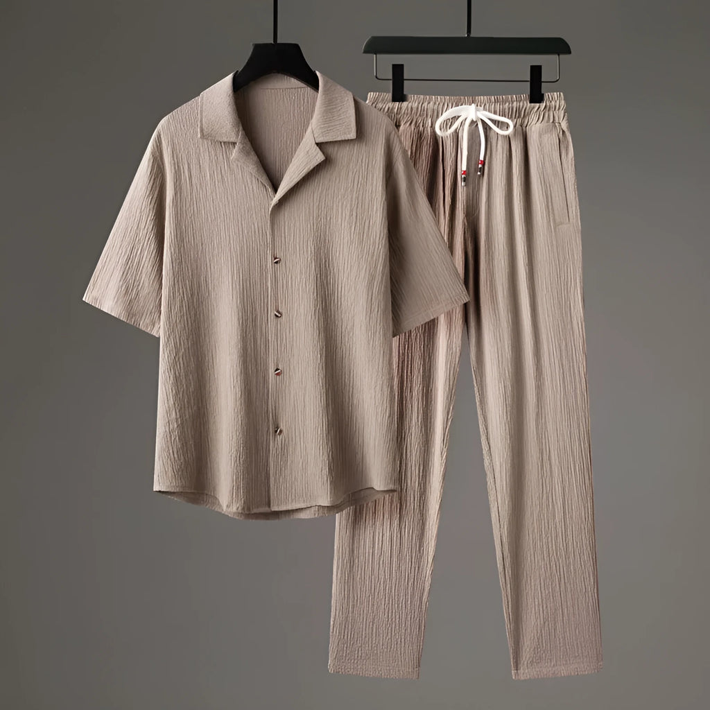 Men's Chinese style two-piece knitwear set showing short-sleeved top and trousers in polyester fabric
