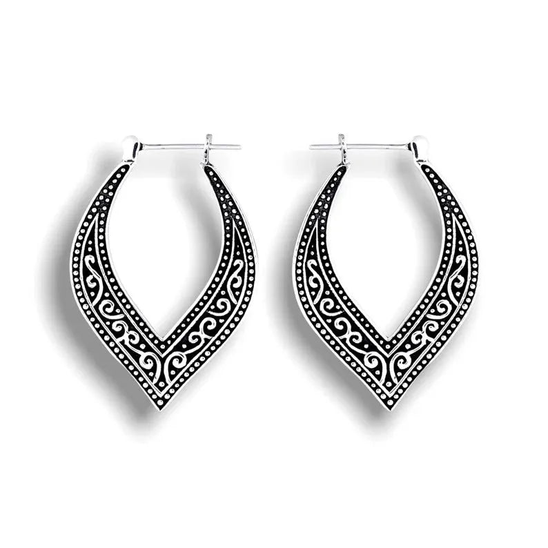 Antique silver alloy carved heart earrings with geometric ethnic style design, one pair