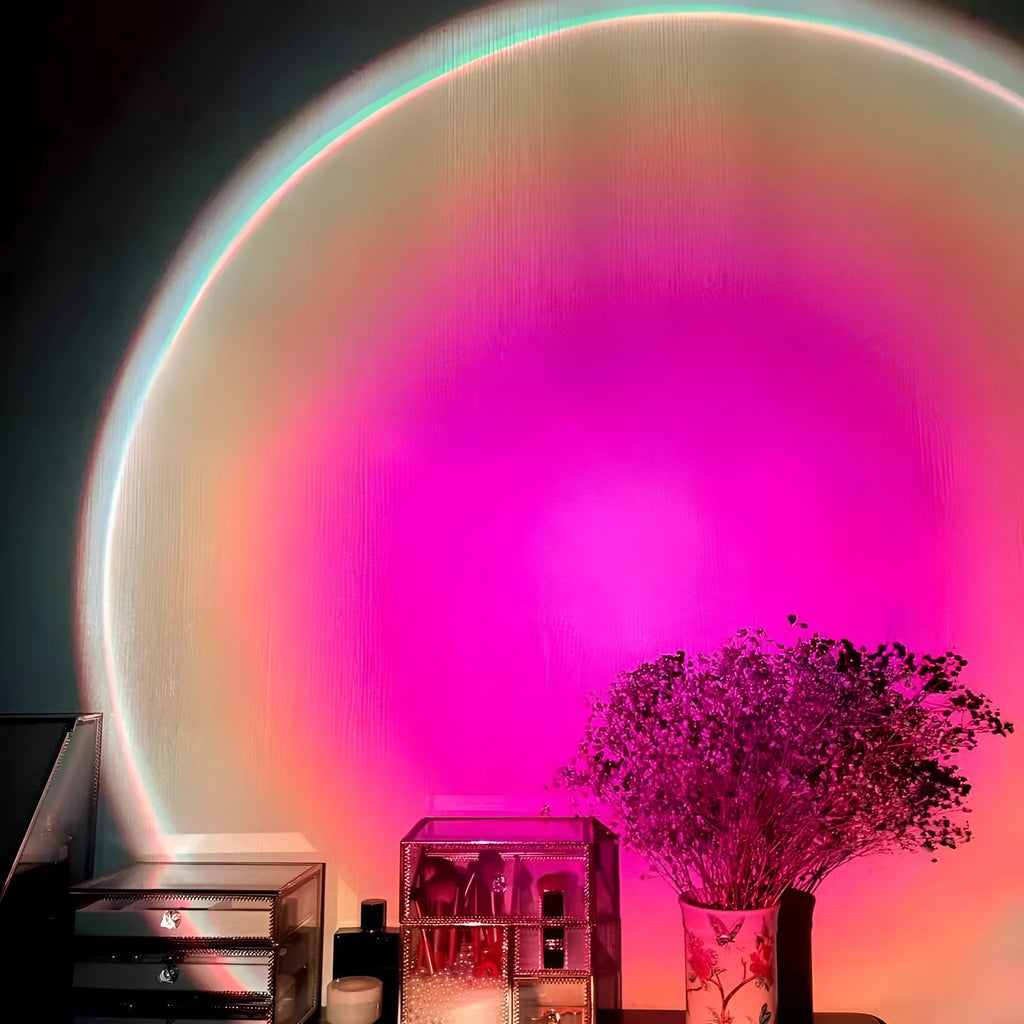 Rechargeable sunset red rainbow projection lamp with USB cable on tabletop