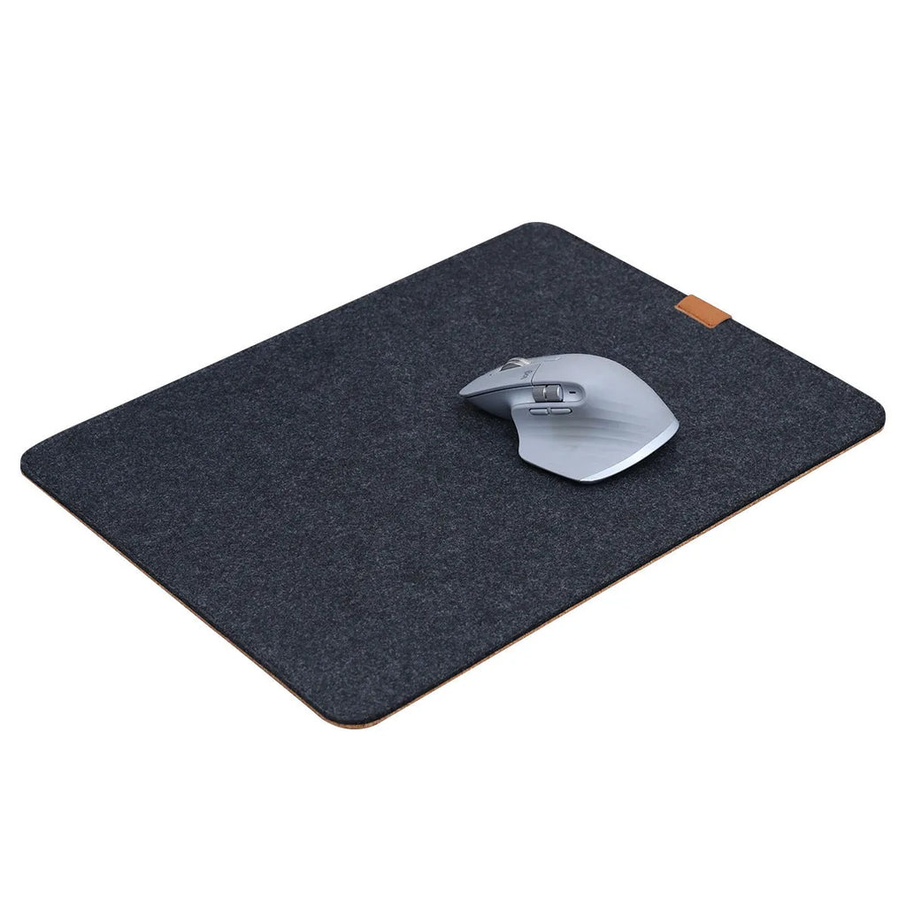 Winter warm grey felt and cork mouse mat with Japanese simple style on office desk
