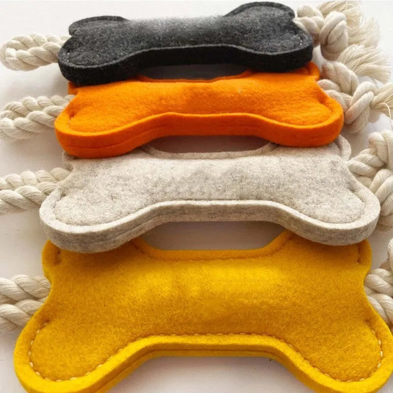 Bone-shaped dog chew toy with a rope knot interior and a soft felt exterior, shown in blue colour.
