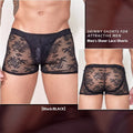 Men's black boxer shorts with a white lace trim detail around the leg openings.