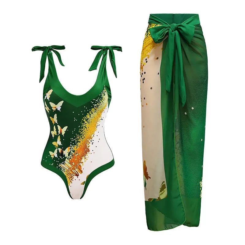 Women's solid colour one-piece swimsuit with spaghetti straps and a matching removable skirt.