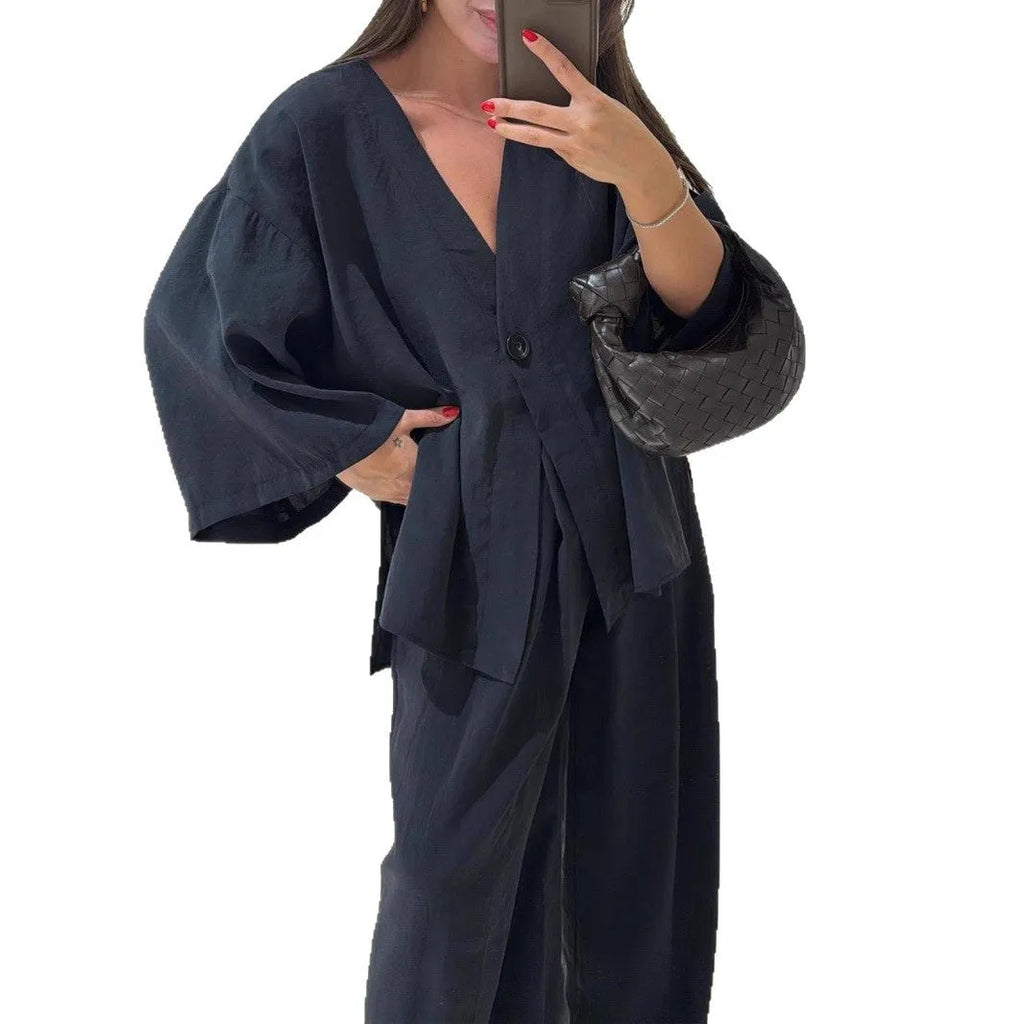 Women's solid colour two-piece set with long sleeve cardigan top and matching trousers, zip and button front, sizes S to XXL