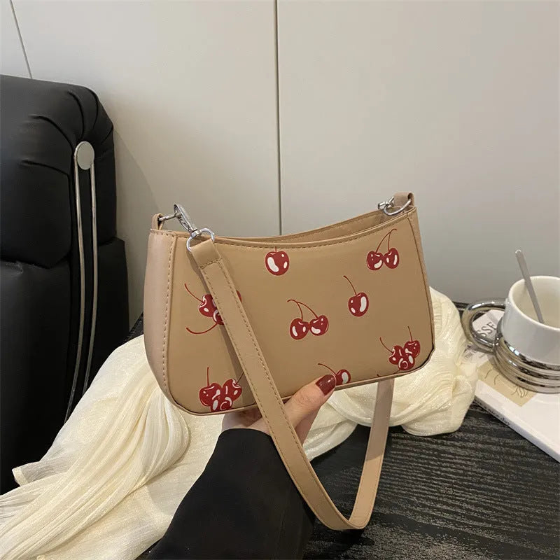 Dumpling-shaped PU underarm bag with floral print, single shoulder strap, three-dimensional outer pocket, in khaki.