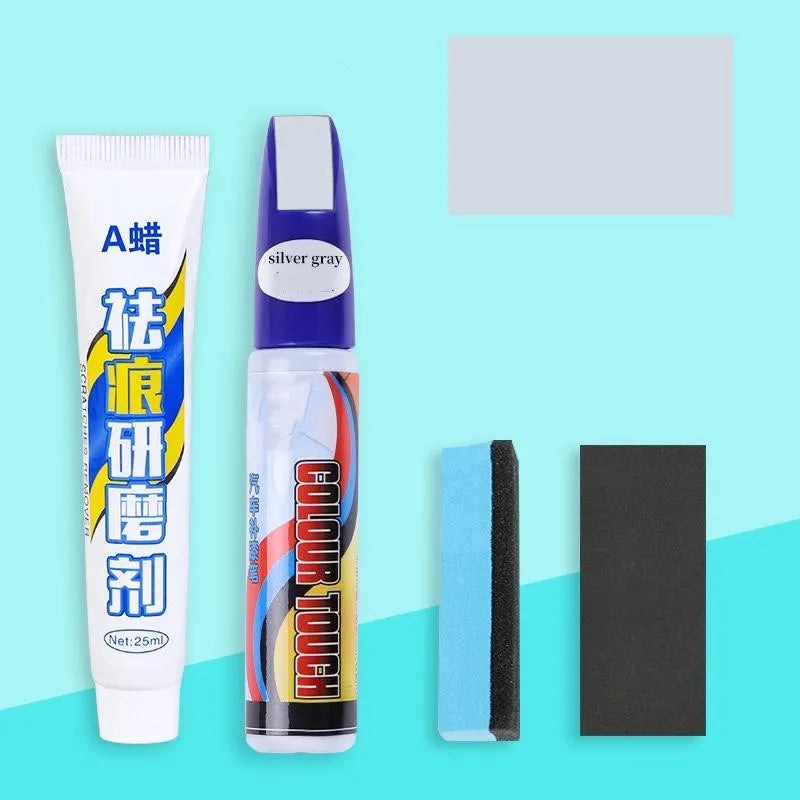 Automotive scratch repair kit showing touch-up paint pen, wax tube, sandpaper, and sponge for car paint touch-up.
