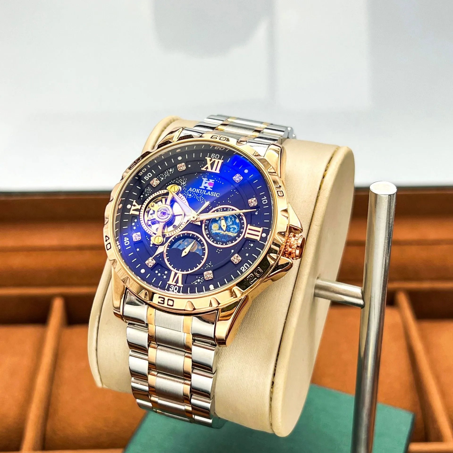 Automatic mechanical men's watch with rose gold case, black dial, and large multifunctional display