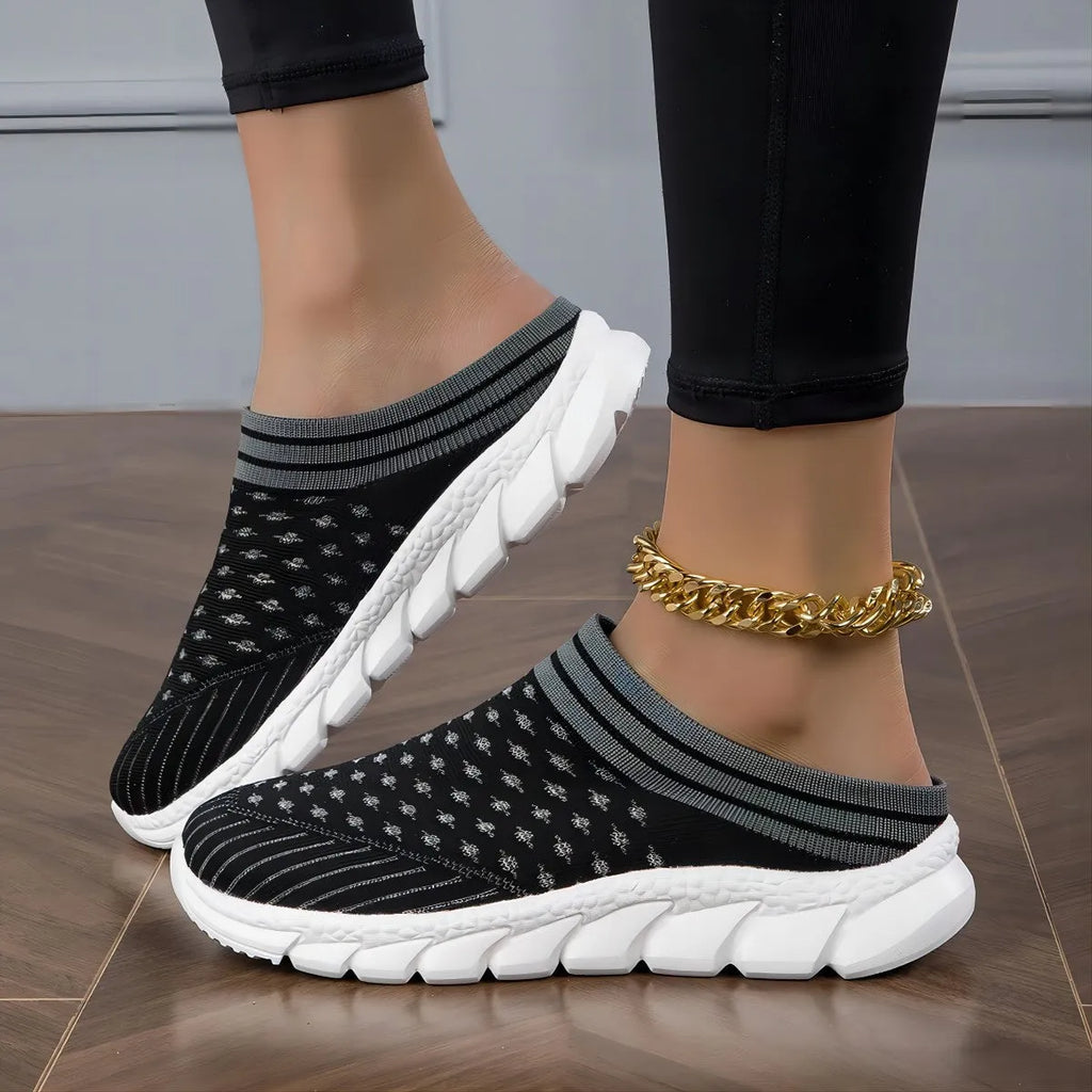 Women's black striped Flyknit casual slipper shoes with hollowed-out design and height increasing sole.