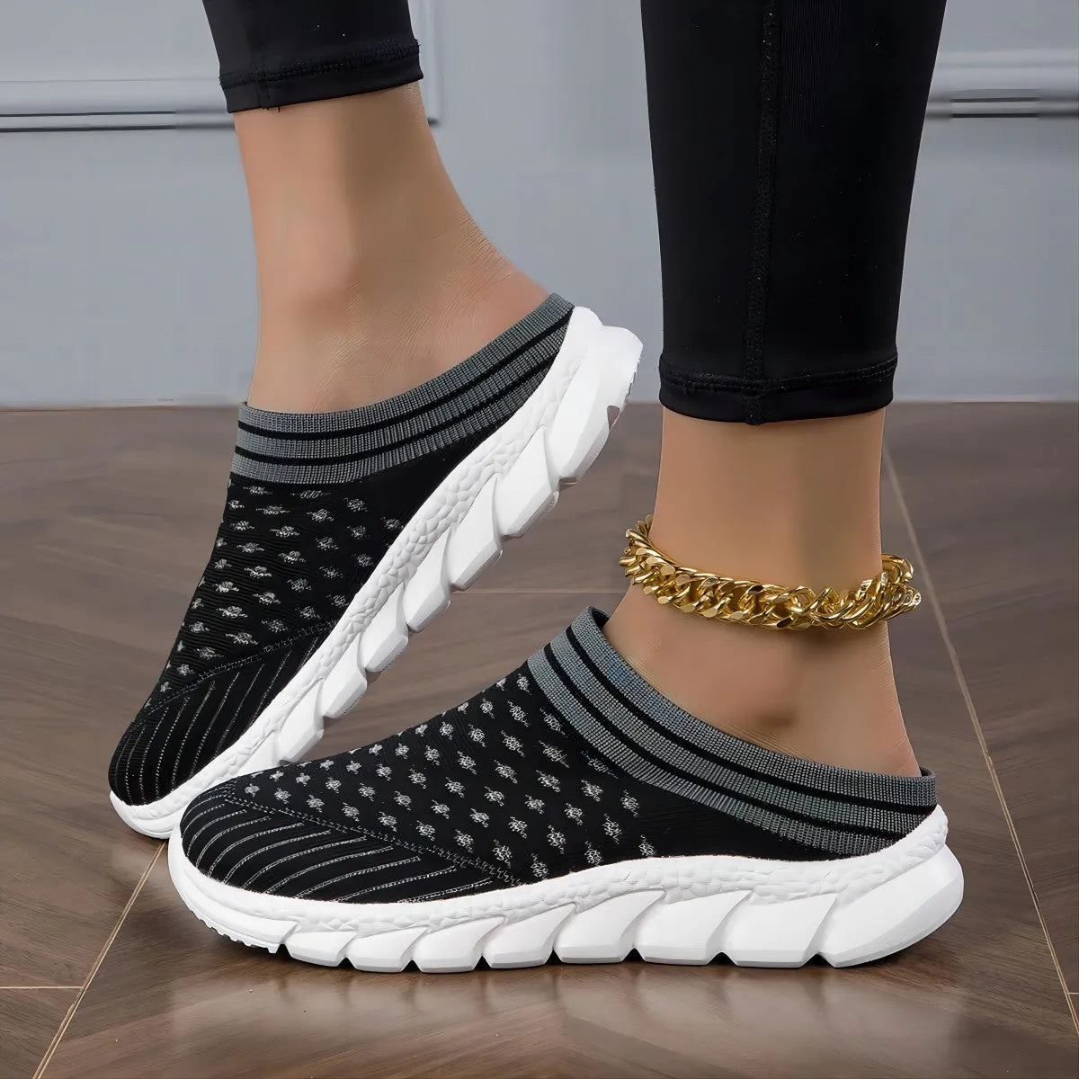 Women's black striped Flyknit casual slipper shoes with hollowed-out design and height increasing sole.