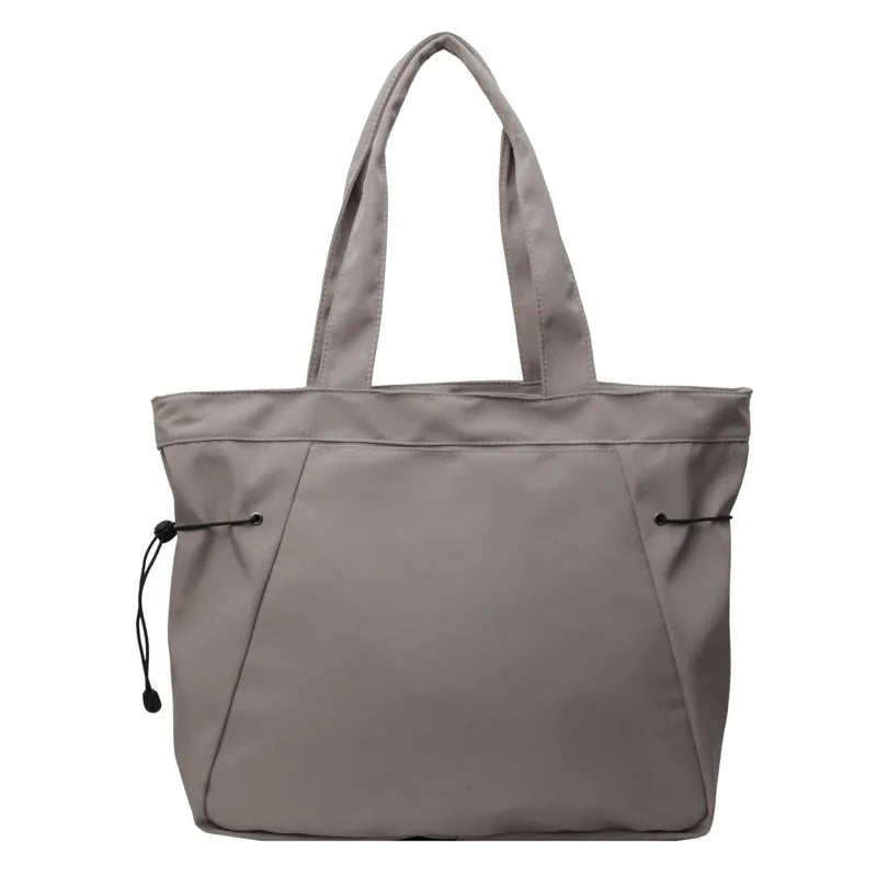 Soft foldable Oxford cloth women's shoulder tote bag shown in available colours: black, brown, dark grey, light grey, purple.