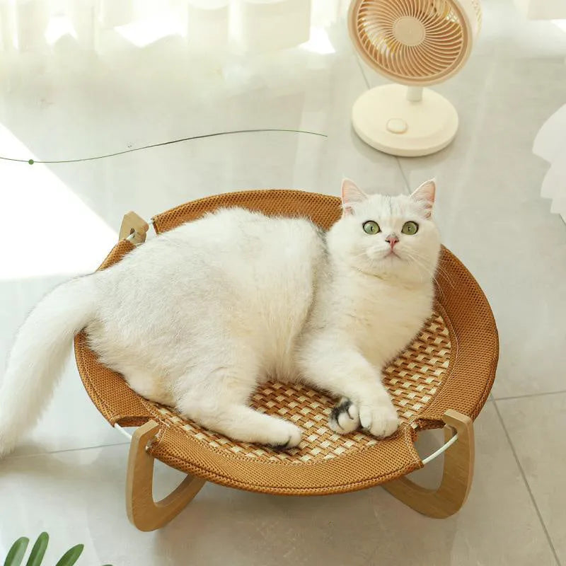 Brown woven rattan pet bed measuring 46x46cm with 17.5cm raised platform for cats and dogs