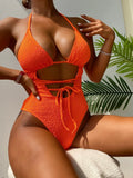 Orange one-piece swimsuit for women in sizes S M L with polyester fabric and lining