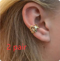 Gold electroplated alloy starfish conch shell drop earrings for women
