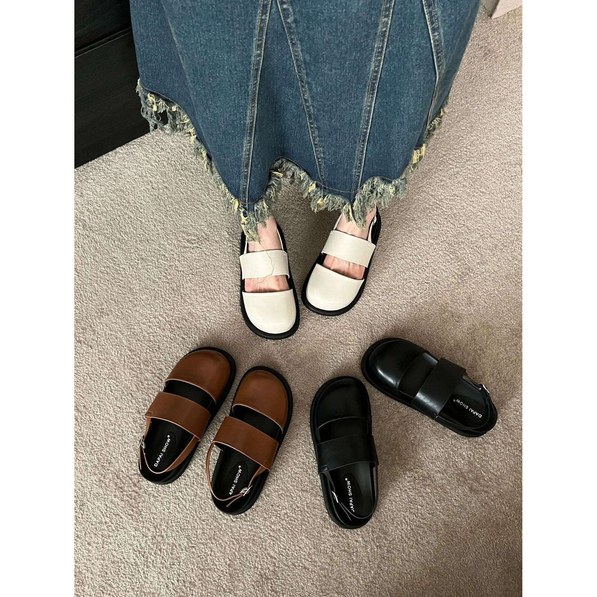 Retro closed-toe sandals with an adjustable ankle strap buckle in black, brown, or apricot colour.