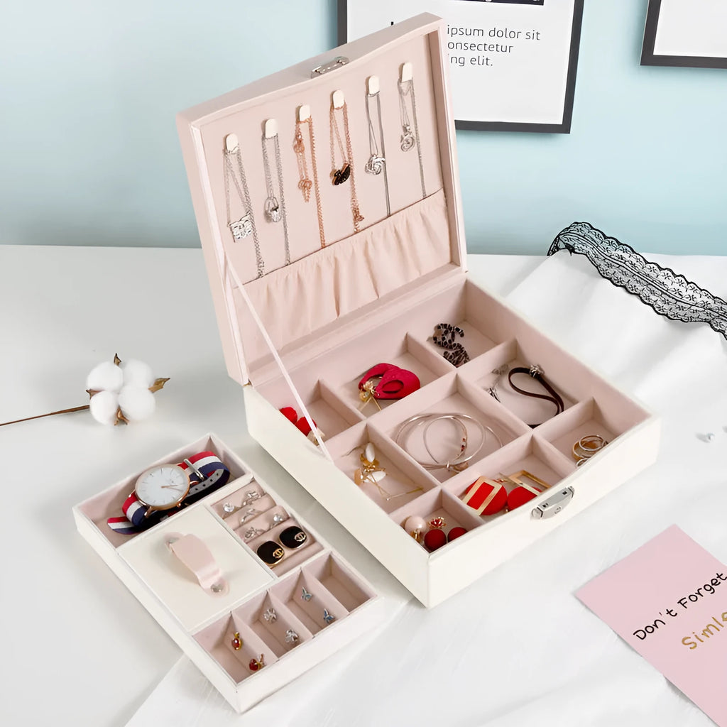 Red PU leather jewelry storage box with compartments for necklaces and rings