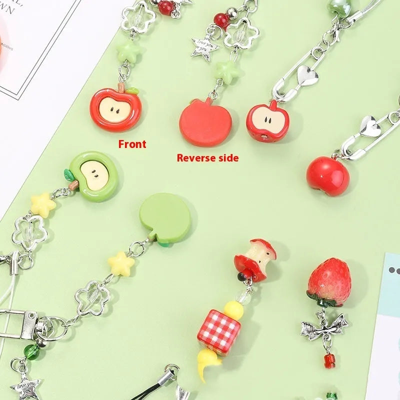 Fruit pattern mobile phone charm keychain with apple and strawberry designs on plastic resin