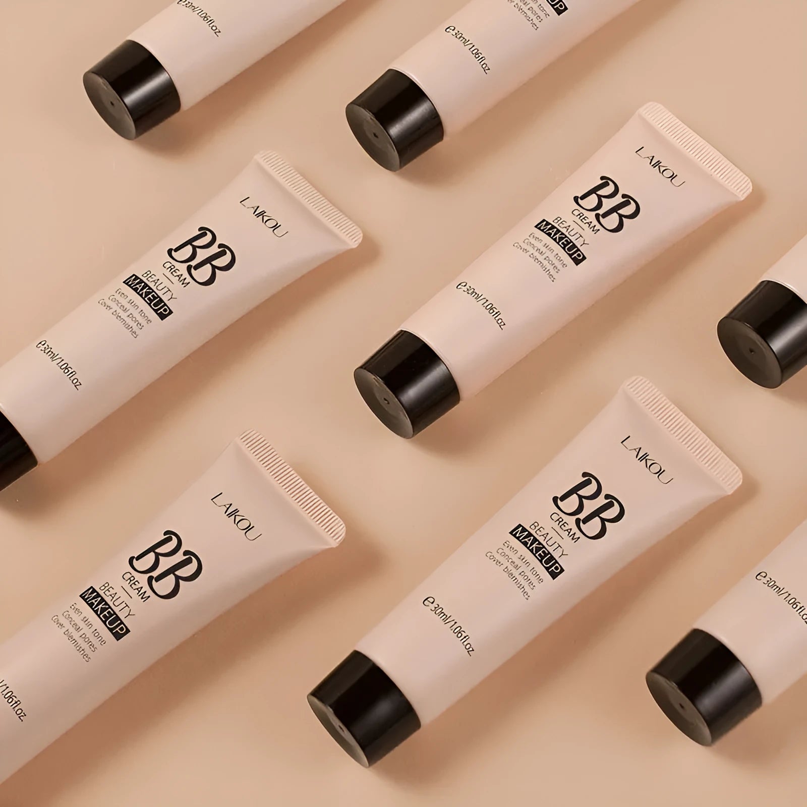 30ml bottle of BB cream showing nine shade options from light ivory to dark brown.