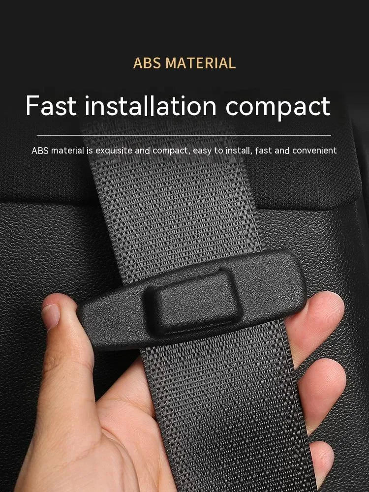 Two black ABS plastic car safety belt stopper clips for universal seatbelt tension adjustment