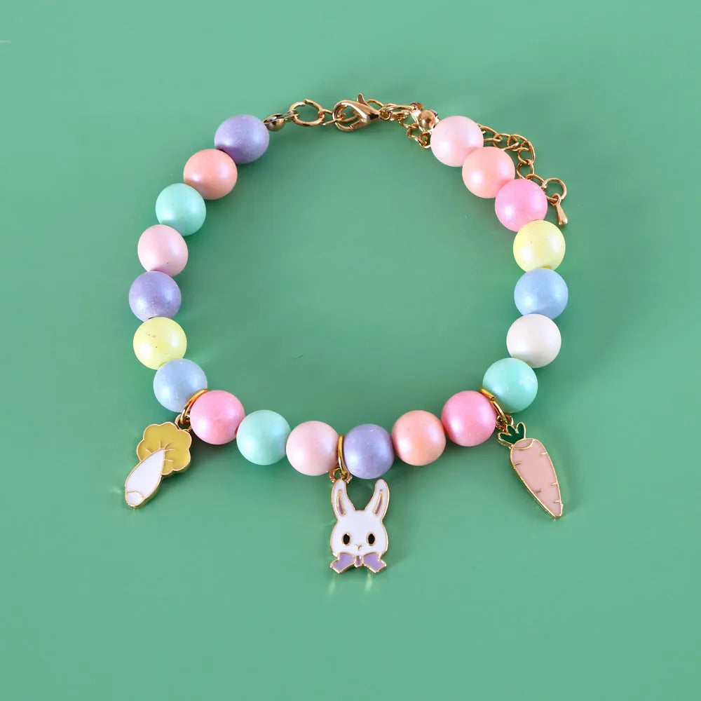 Macaron-colour resin collar and bracelet set for a small dog, showing the matching necklace.