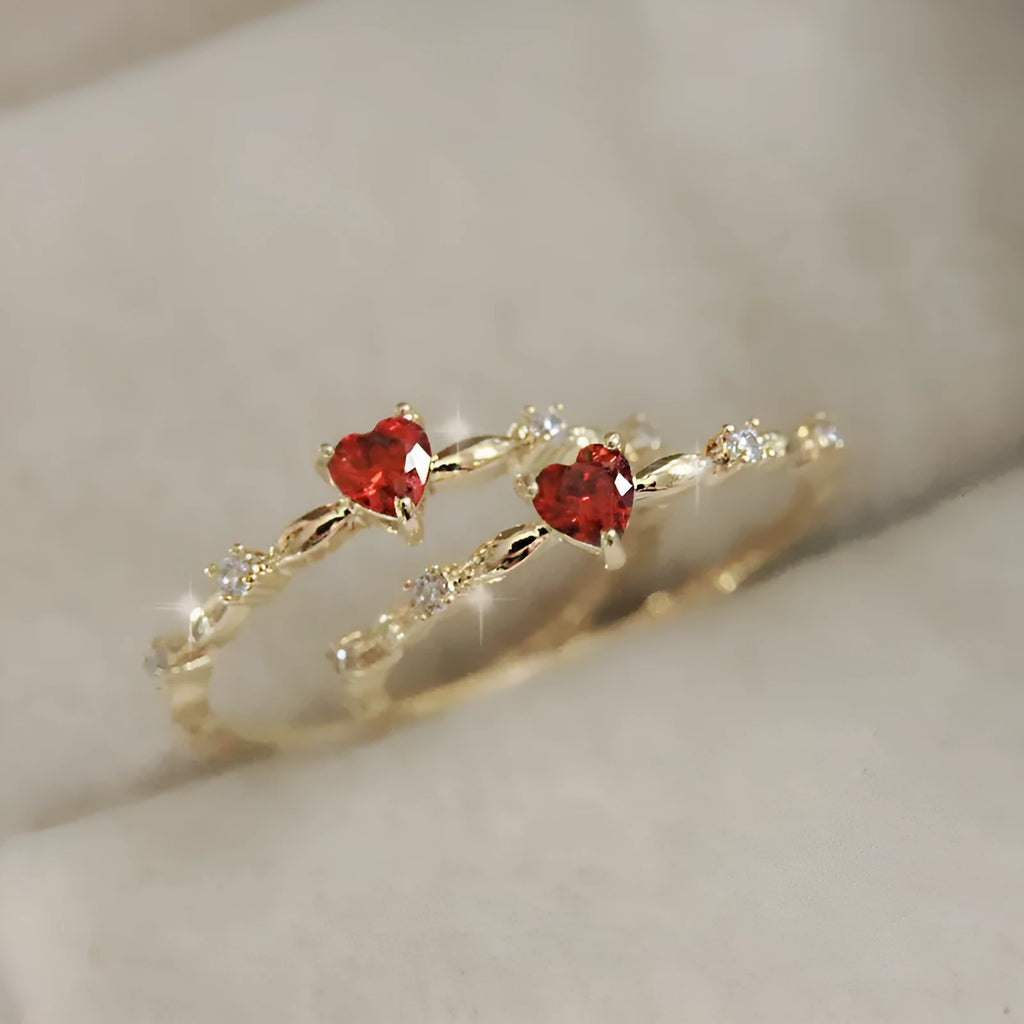 Zircon peach heart ring in gold or silver electroplated finish on copper, shown in UK sizes 6-10