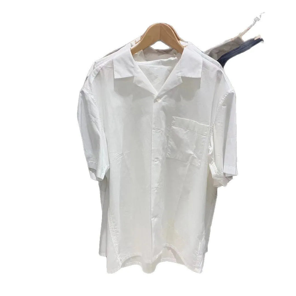 Man wearing a beige open collar modal cotton blend casual shirt with regular sleeves.