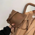 Retro unisex woven PU crossbody bucket bag shown in khaki colour.