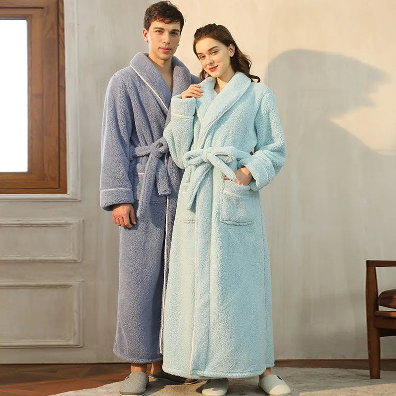 Man and woman wearing matching thick plus size flannel bathrobes in Angola red, winter nightgown pajamas.