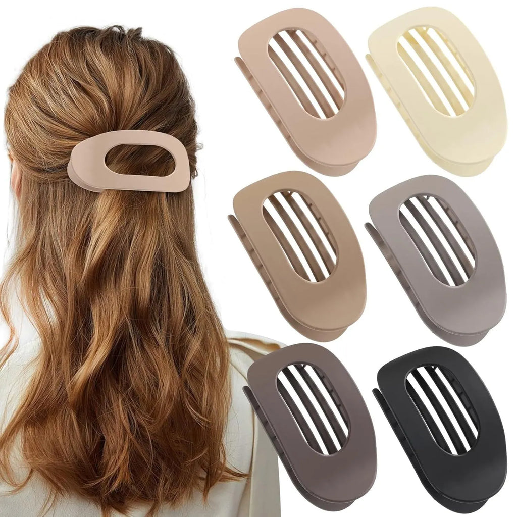 Six rose red and nude plastic hair clips with frosted grips and a quadrilateral shape.