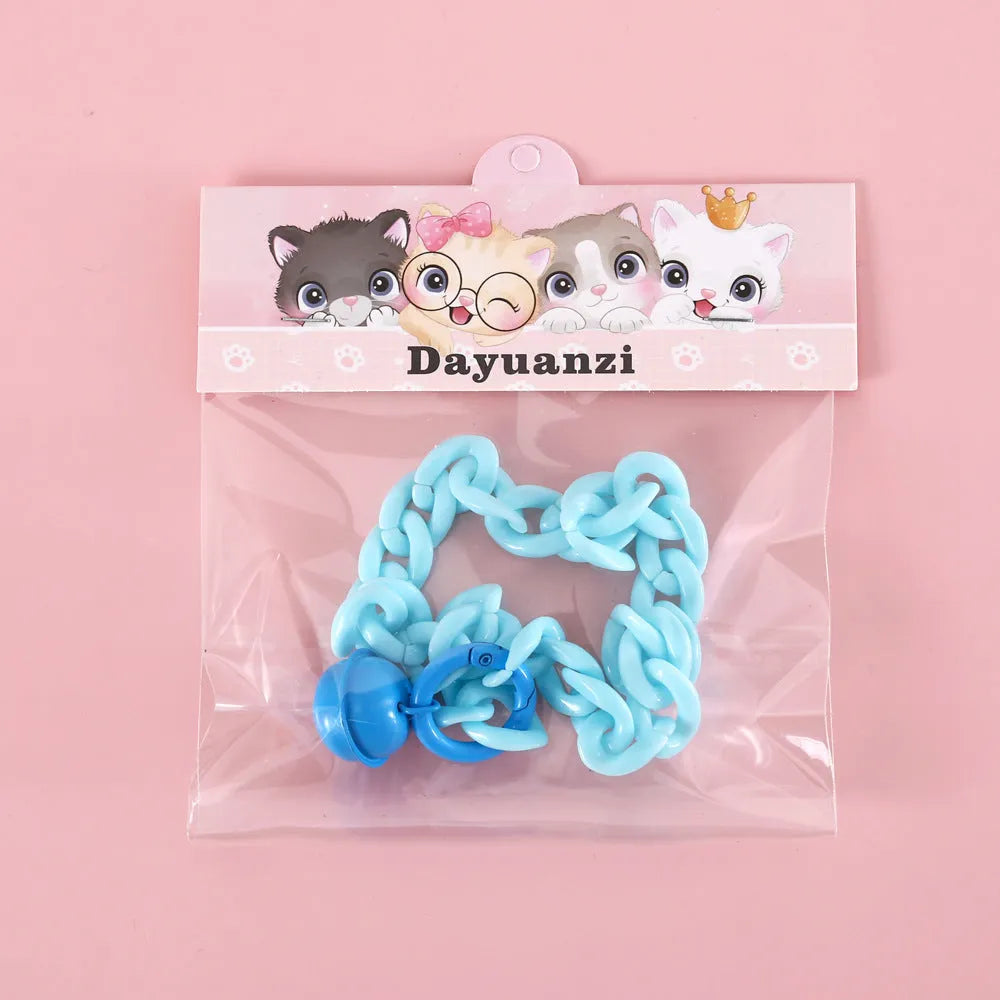Macaron candy coloured plastic pet collar for cats, dogs, or rabbits on a chain.